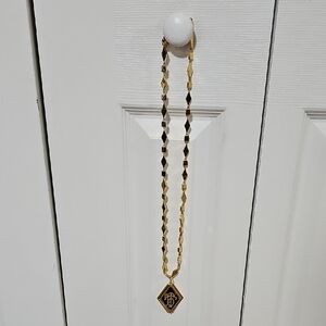 Tory Burch Gold-Tone Pendant Necklace with Black Enamel Logo